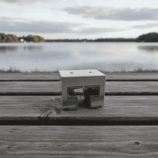 Profile view of HardPoint rail clamp sitting on a dock