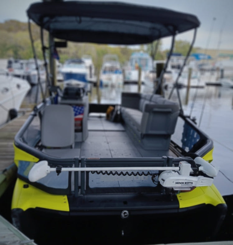 Fishing boat on a dock with a cityscape in the background
