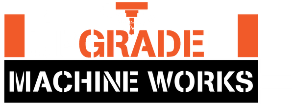 A logo-style graphic reading 'UPGRADE MACHINE WORKS' with orange and white text on a black background, plus orange side blocks and a small hanging tool icon above the word UPGRADE.  Reminiscent of a Machine Tool Vise